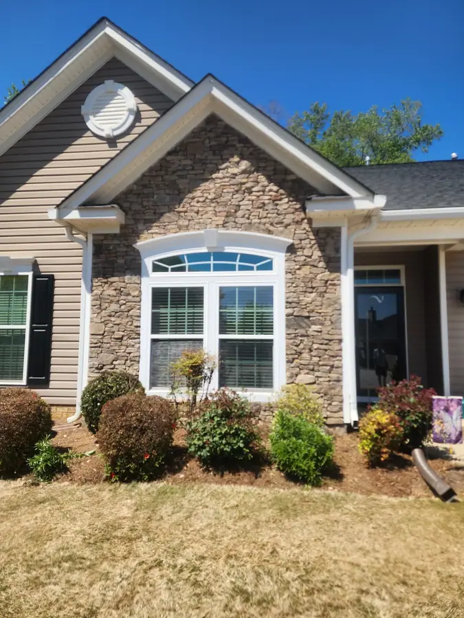This Simpsonville home went from vinyl siding to hand-stacked Tennessee fieldstone — a total transformation.